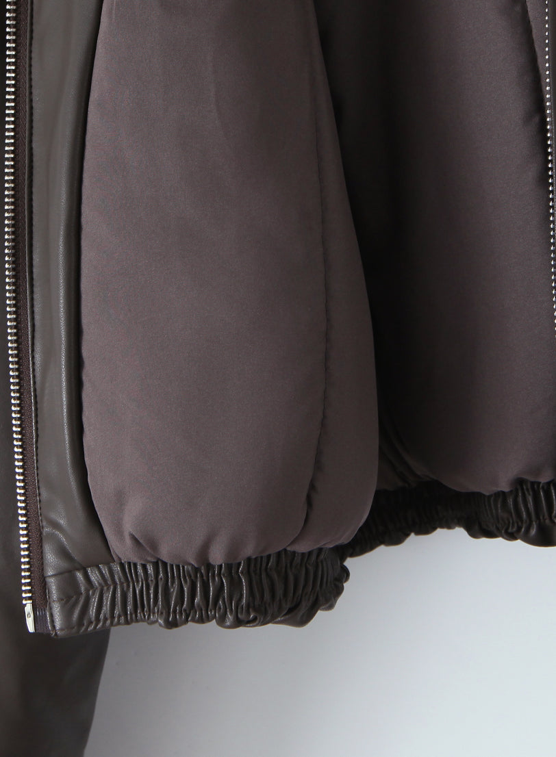 Loose faux leather bomber jacket by Langry with silver zipper and elastic hem