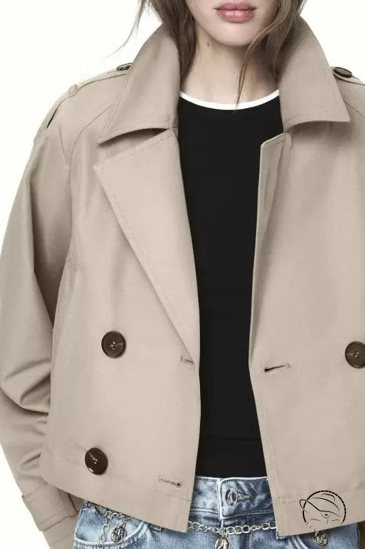 Casual double breasted short trench coat in beige with buttons and epaulettes