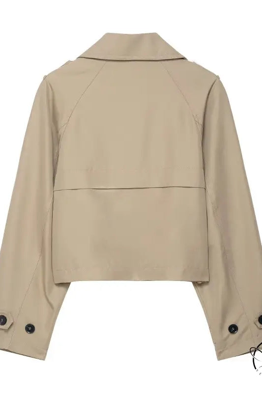 Beige double breasted short trench coat with buttoned cuffs