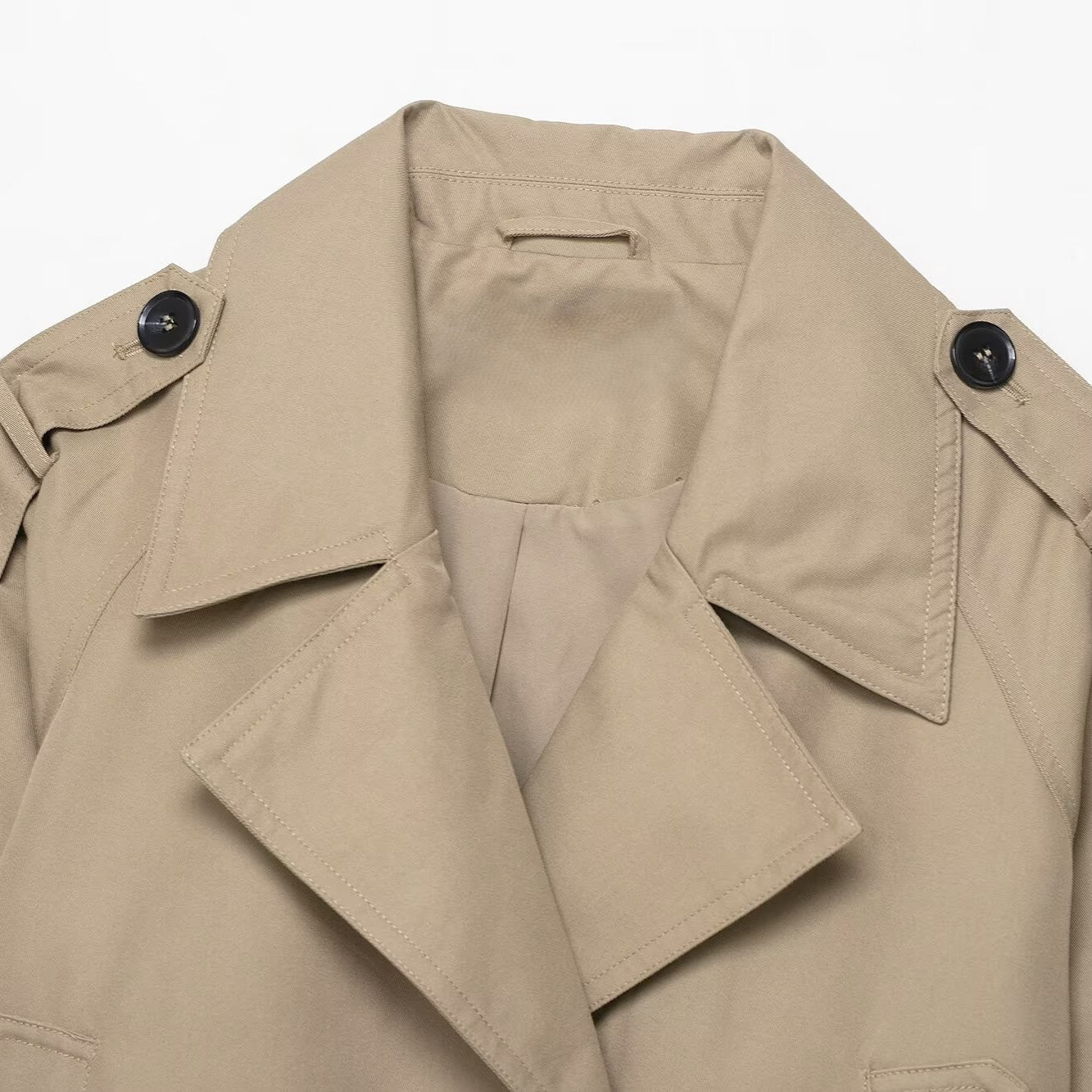 Casual double breasted short trench coat in beige with black buttons