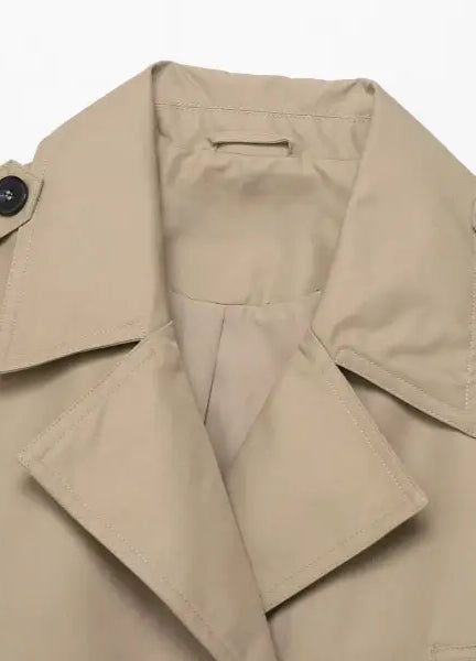 Casual double breasted short trench coat in beige with black buttons