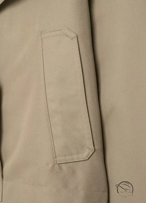 Beige double breasted short trench coat with laptop sleeve pocket