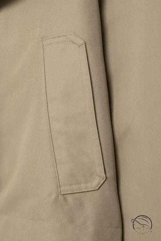 Beige double breasted short trench coat with laptop sleeve pocket