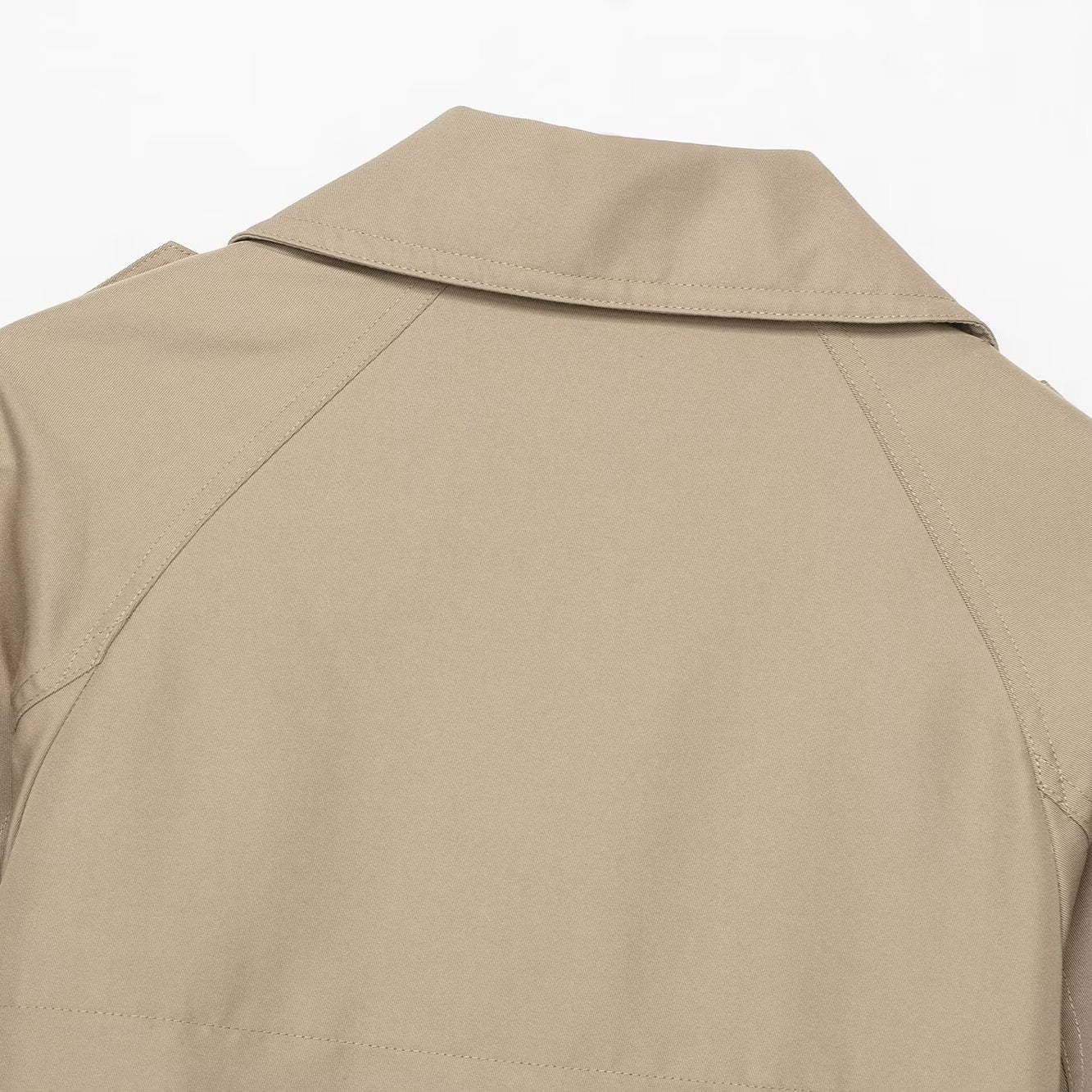 Casual double breasted short trench coat in beige with epaulettes