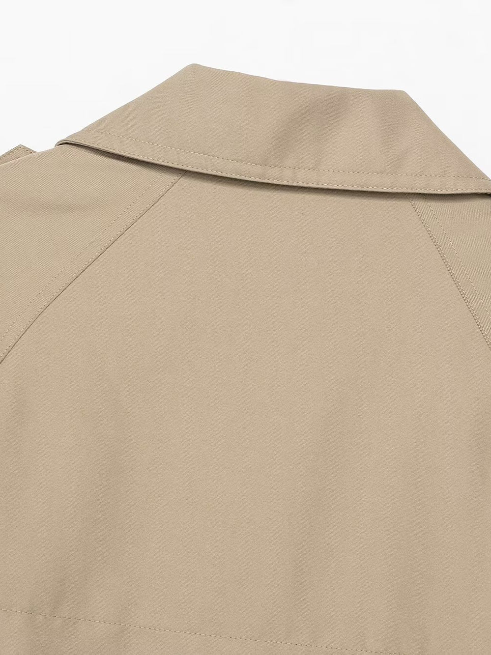 Casual double breasted short trench coat in beige with epaulettes