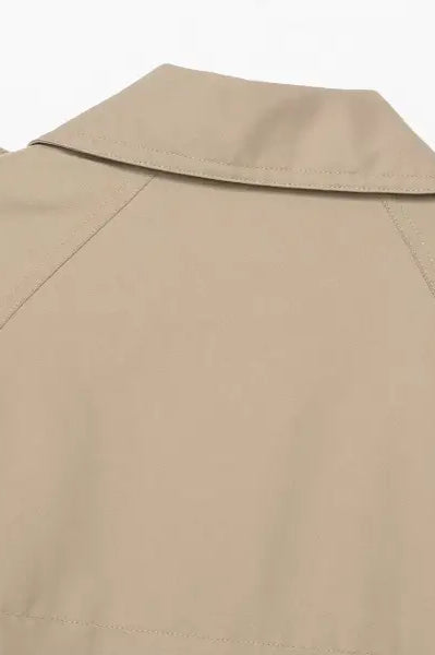 Casual double breasted short trench coat in beige with epaulettes