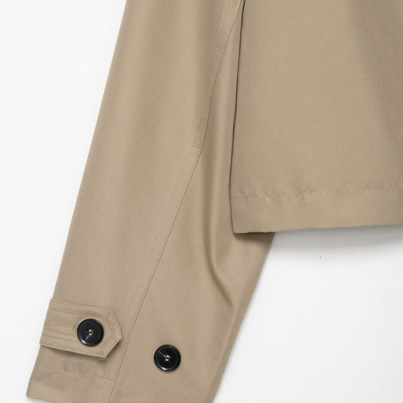 Casual double breasted short trench coat in beige with black buttons
