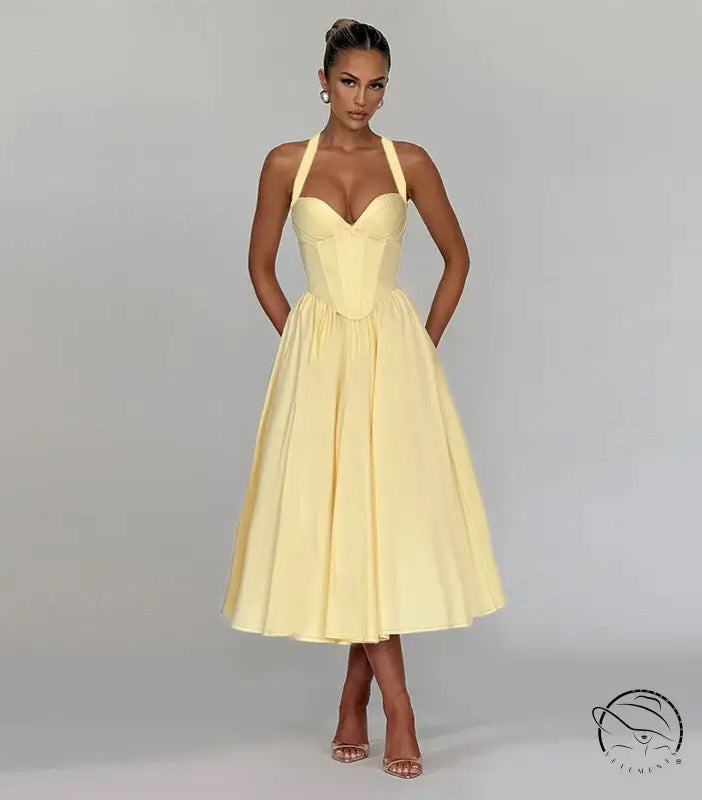 Yellow halter bow waist A-line maxi dress in langry fashion ملابس