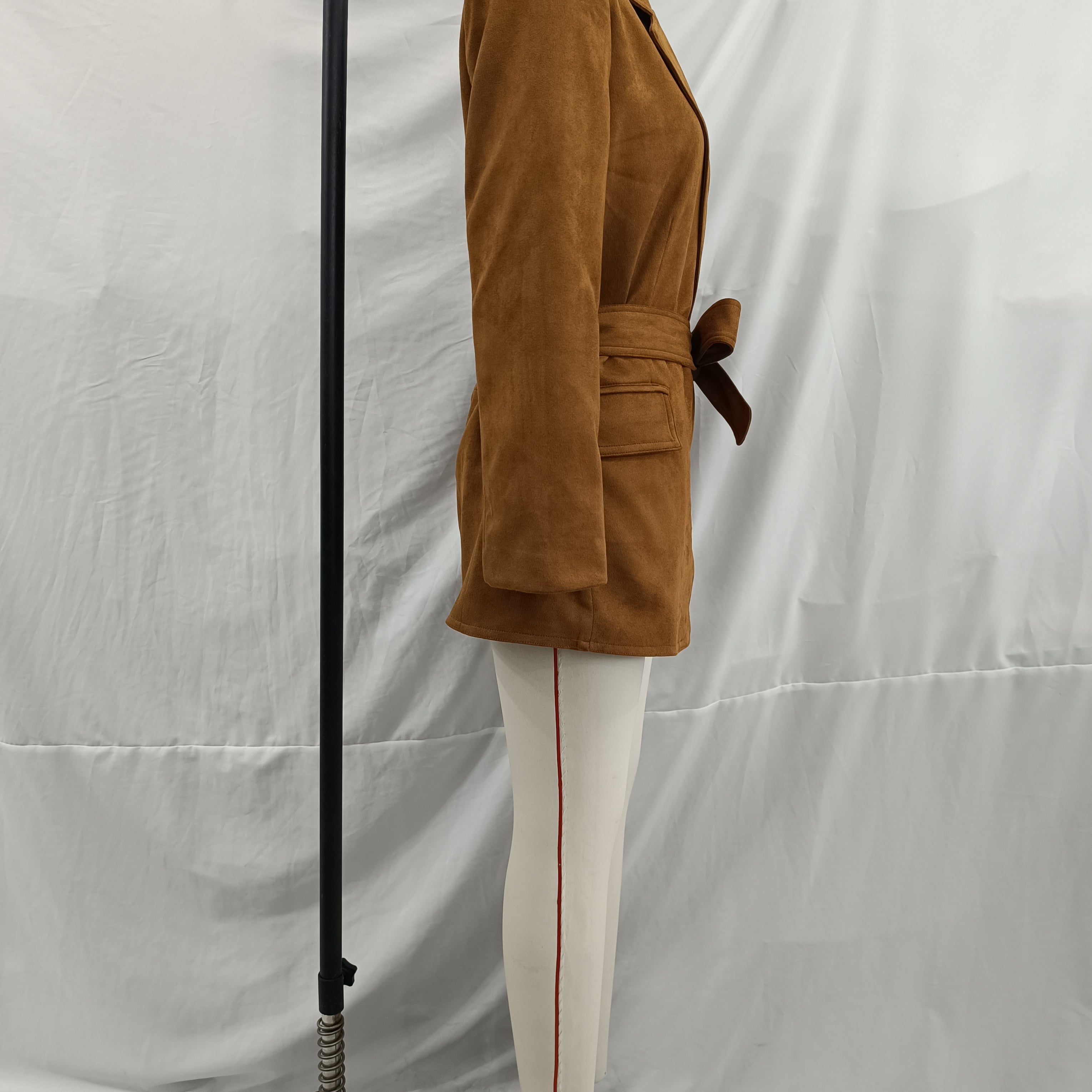 Elegant langry fashion suede blazer in brown corduroy with white pants and red stripe