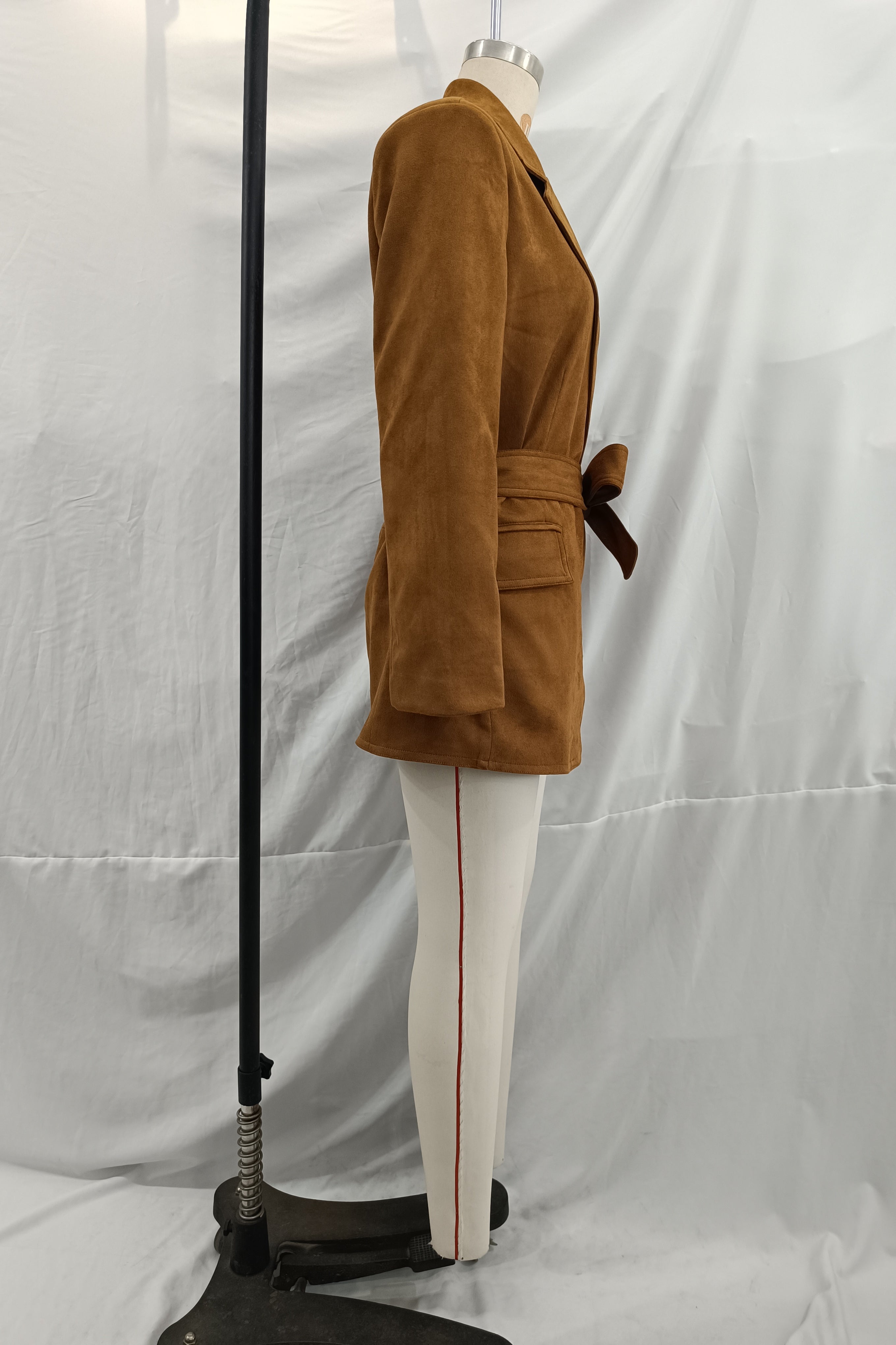 Elegant langry fashion suede blazer in brown corduroy with white pants and red stripe