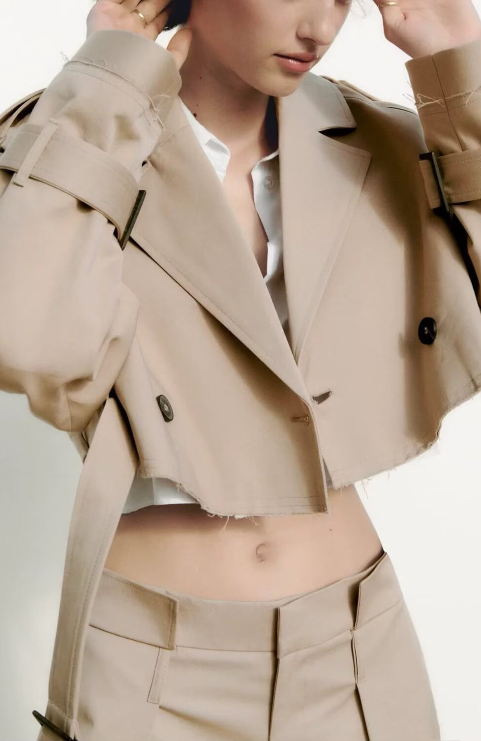 Beige double-breasted trench coat with black accents in Langry fashion
