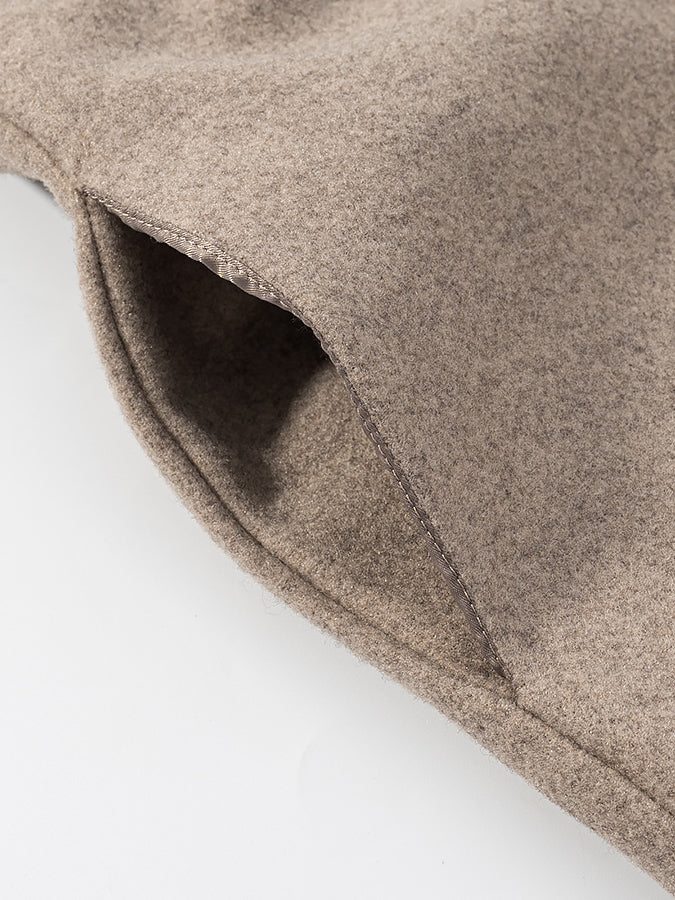 Langry fashion beige wool blend throw pillow with textured surface and hidden zipper