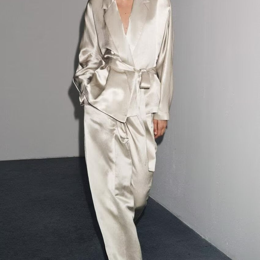 Elegant langry silver silk pajama set with deep V-neck and wide-leg pants