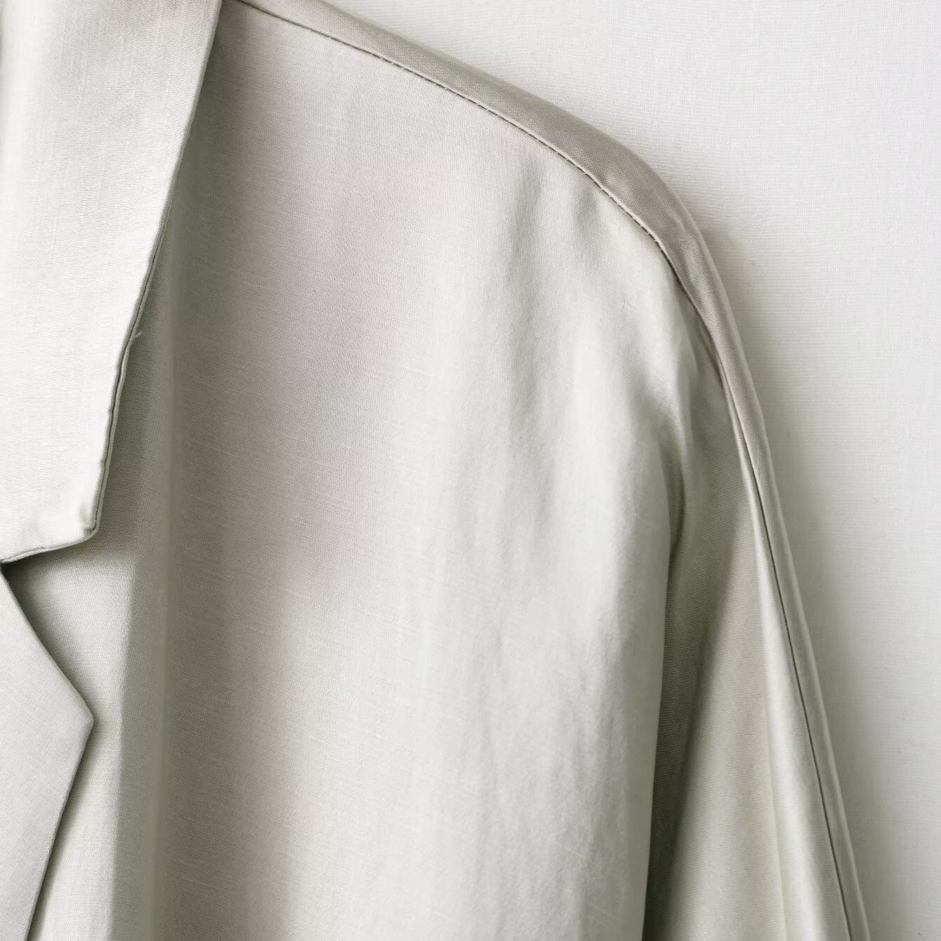 White minimalist Langry fashion blazer with silver trim