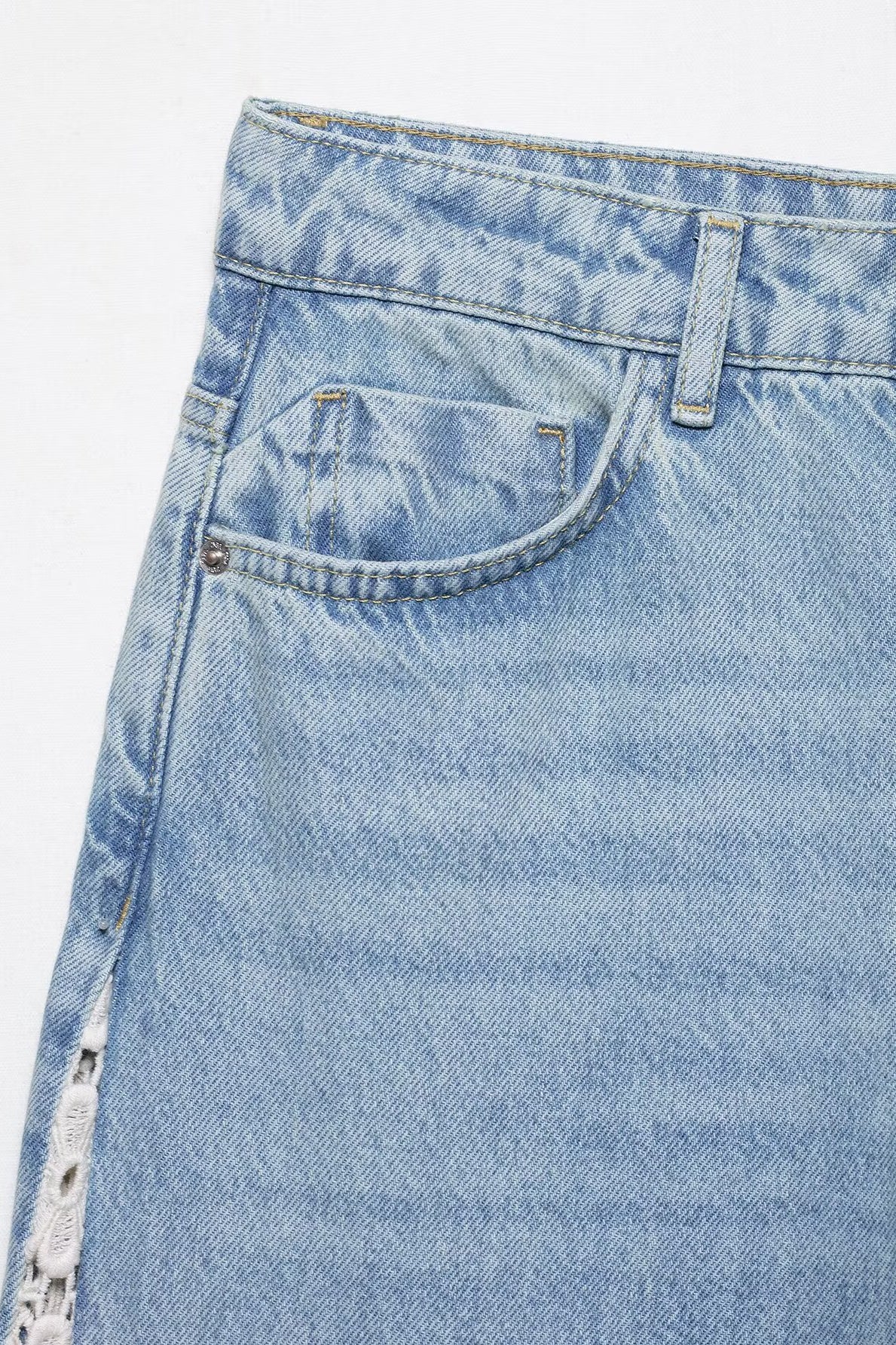 Light blue wide leg denim skirt with side zipper and pocket detail