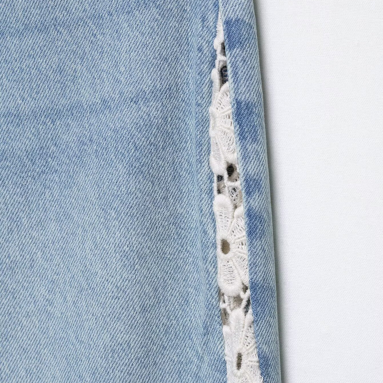 Light blue H&M wide leg jeans with crochet lace hem detailing