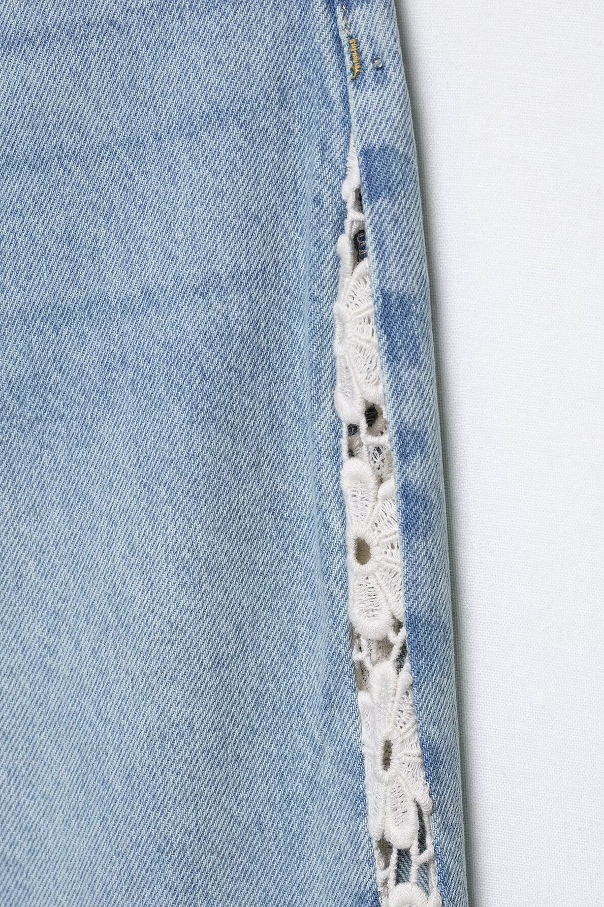 Light blue H&M wide leg jeans with crochet lace hem detailing