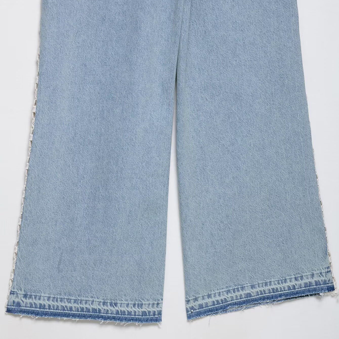 Light blue wide leg Langry fashion jeans with frayed hem and crochet stitching