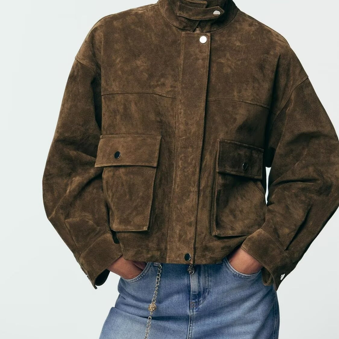 Brown suede leather bomber jacket with patch pockets and chain detail