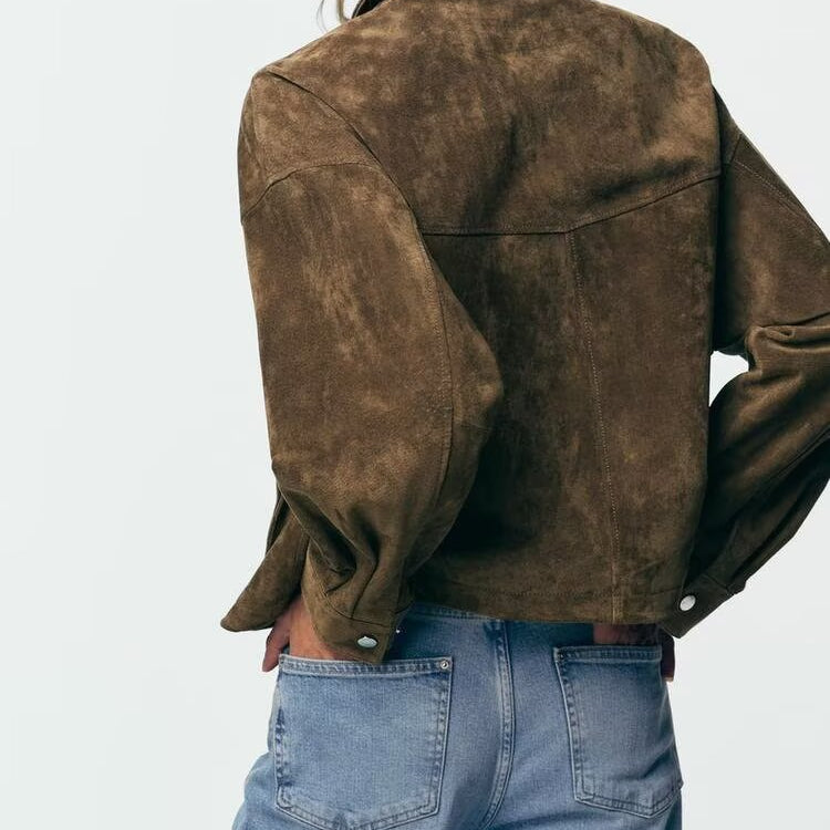 Brown leather bomber jacket with corduroy details and Zara flap pockets