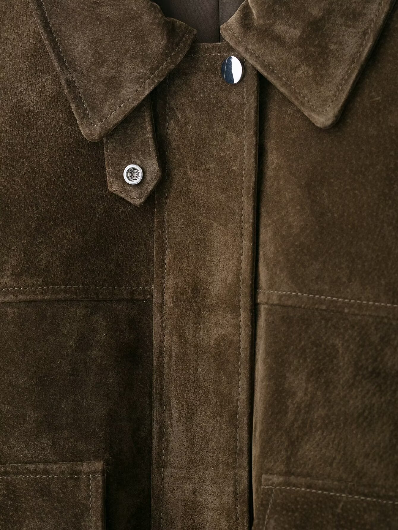 Brown suede leather bomber jacket with silver buttons and pocket details