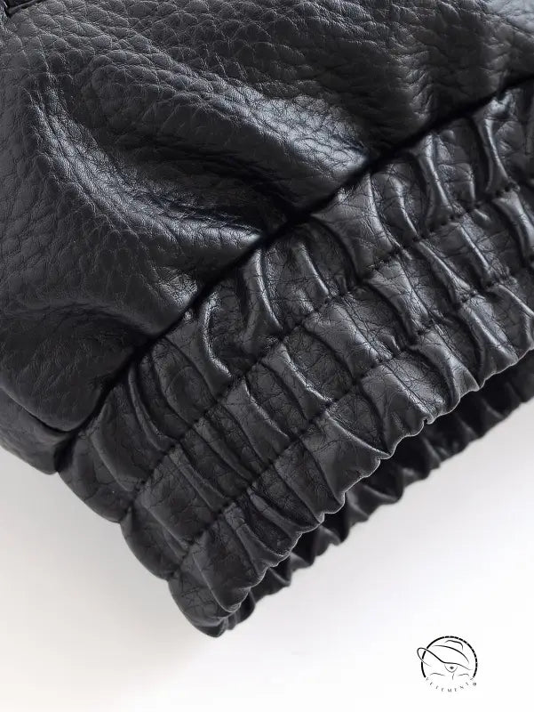 Black faux leather jacket with quilted gloves and textured palm