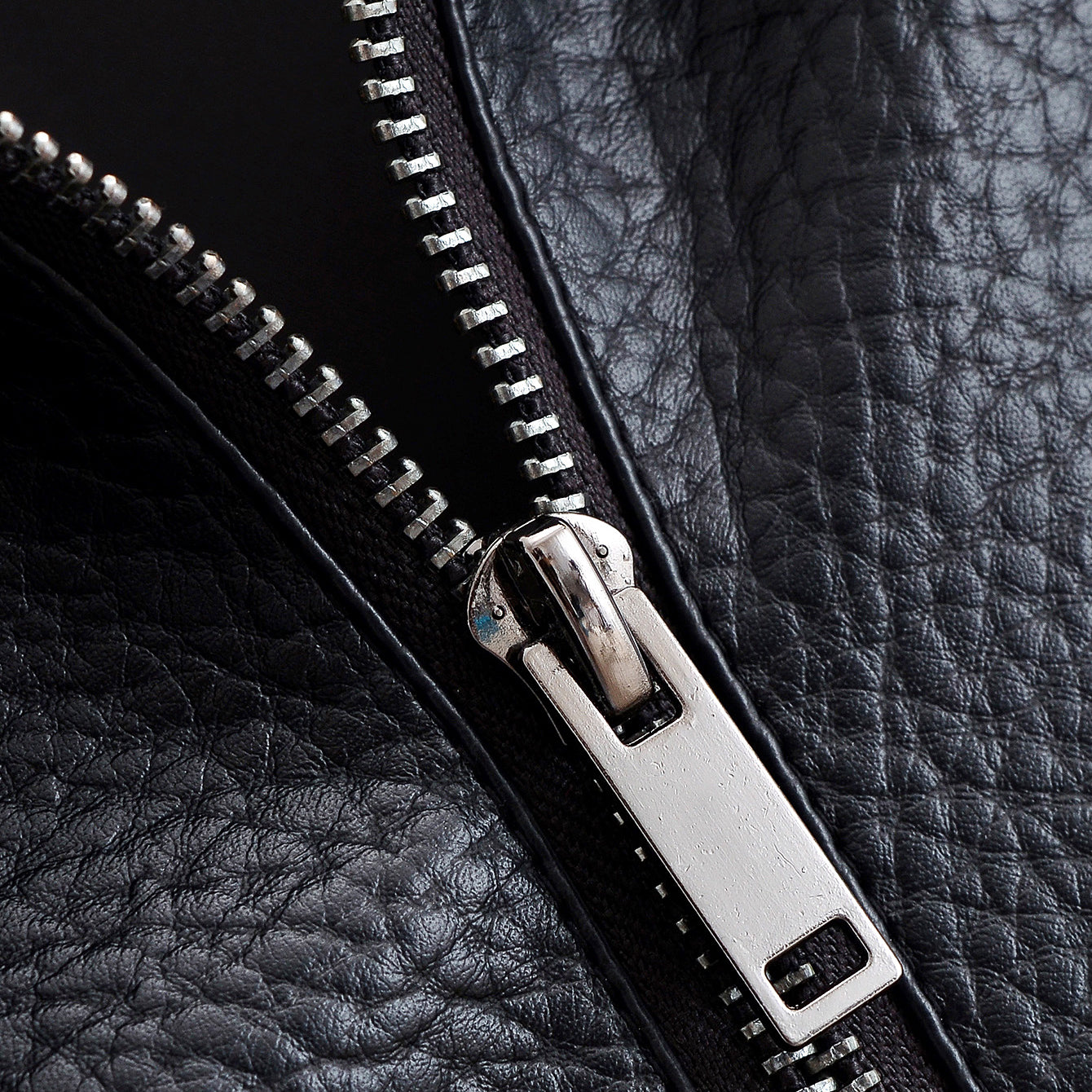 Retro Langry faux leather jacket with silver zipper and stitching