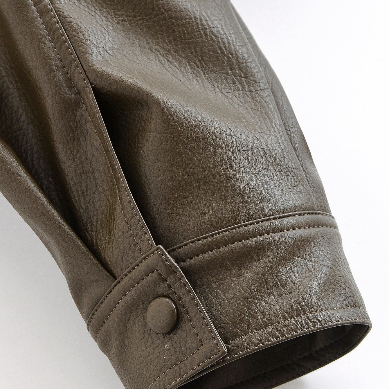 Casual polo collar faux leather short jacket in brown with textured surface and buttoned cuffs