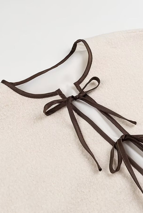 Cozy Lace up Coat with cream drawstring bag in langry fashion