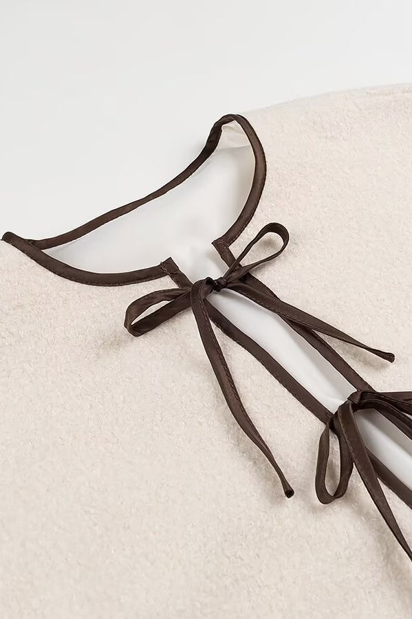 Cozy Lace up Coat with cream drawstring bag in langry fashion