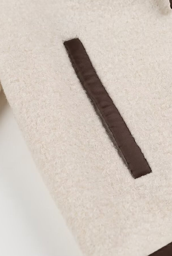 Brown leather belt loop detail on Langry cozy lace up coat fashion item