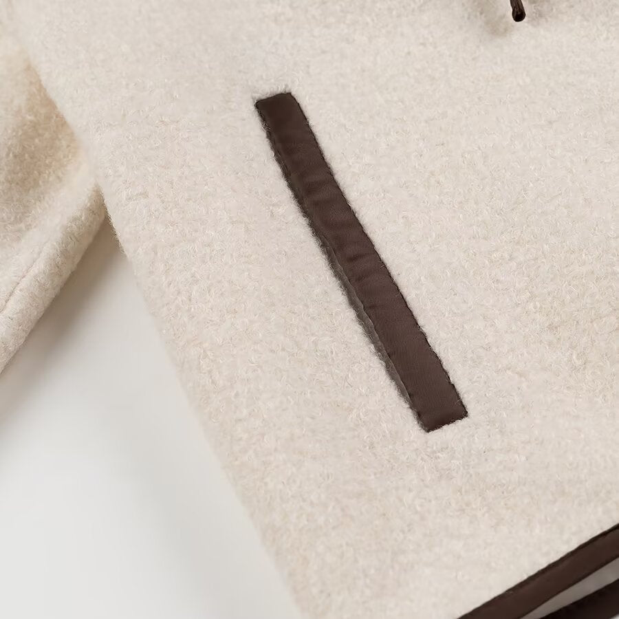 Brown leather belt loop detail on Langry cozy lace up coat fashion item