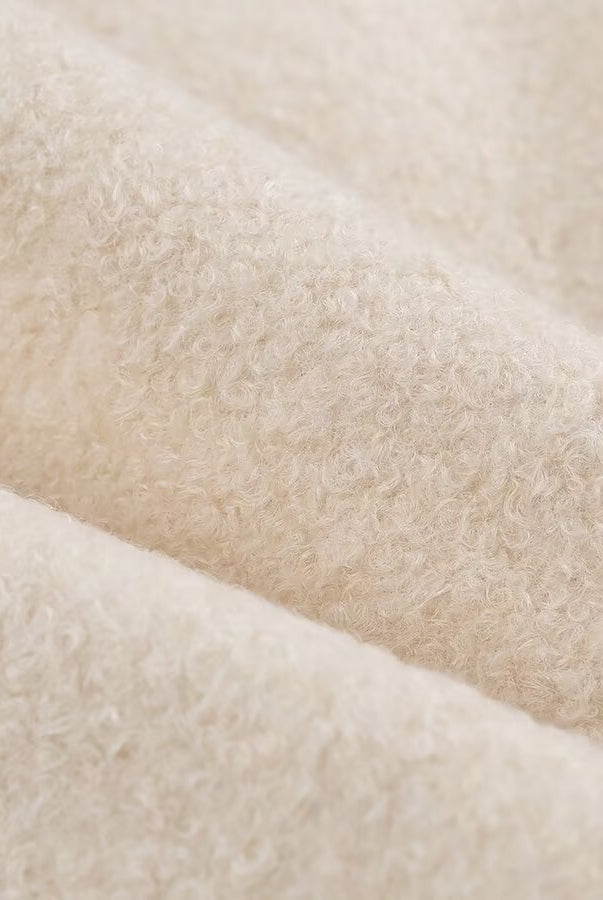 Cozy Langry lace-up coat with cream-colored plush fuzzy blanket texture