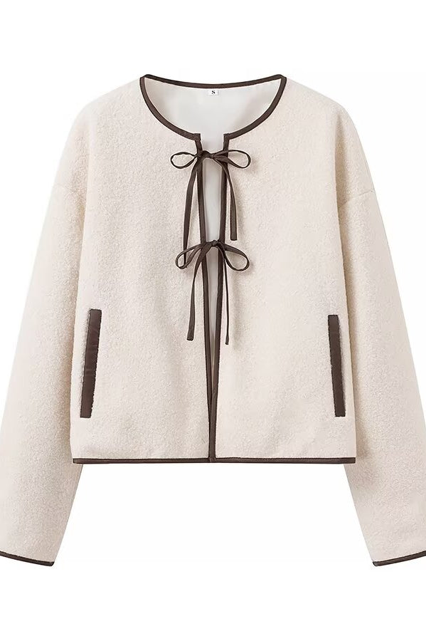 Cozy Langry lace-up coat in cream with black trim, fashion ملابس