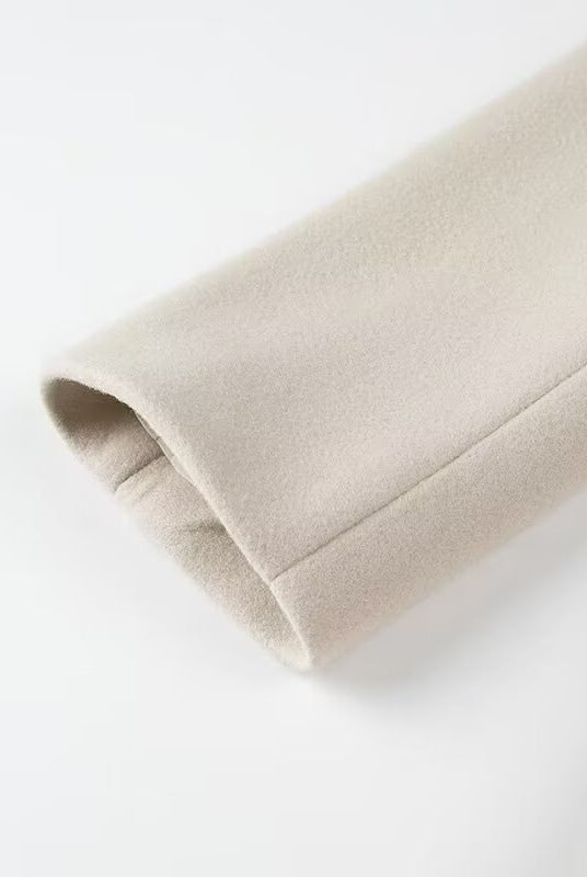Beige fleece-lined arm warmer with elastic cuffs in Langry fashion trench coat