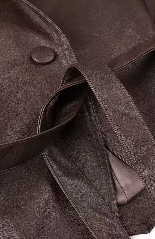 Fashionable langry faux leather jacket with brown button closure and belt detail