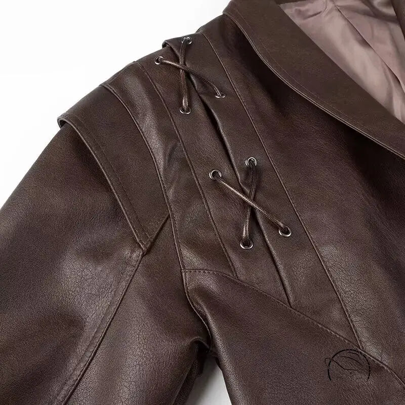 Fashionable faux leather jacket with laces and hooded collar