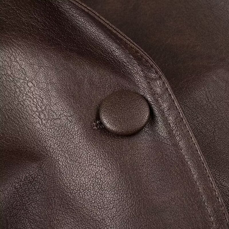 Fashionable Langry faux leather jacket with large buttons and textured brown surface