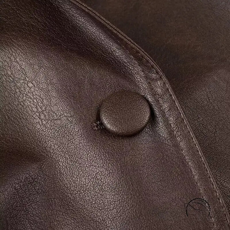 Fashionable faux leather jacket with large buttons and textured surface