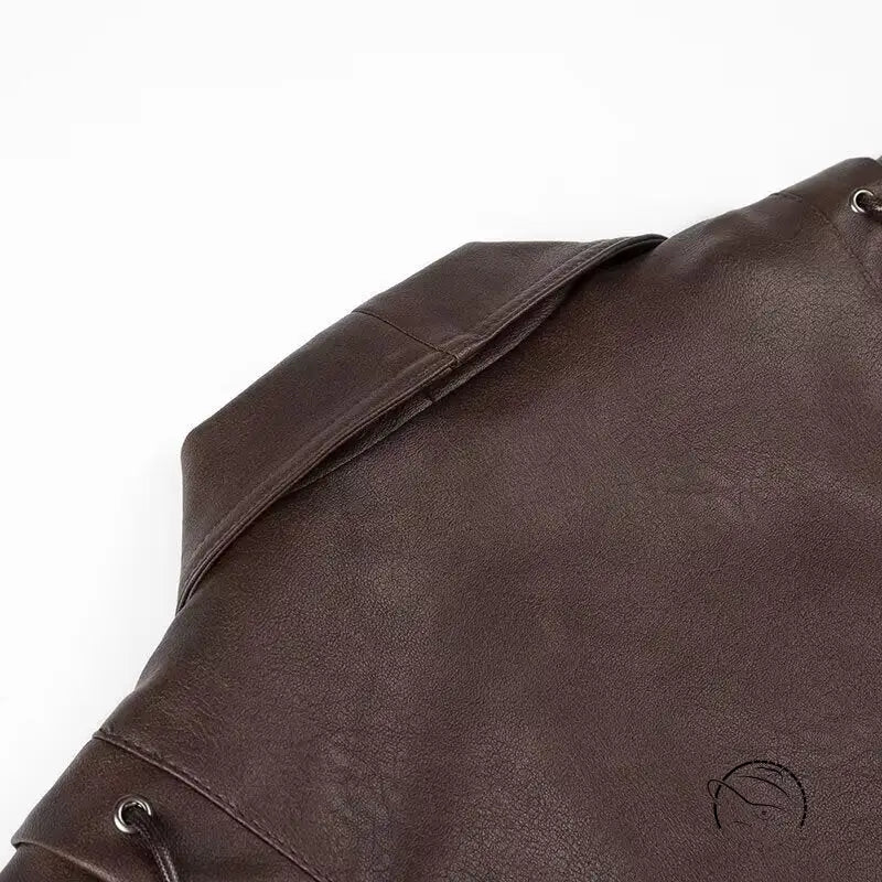 Brown faux leather jacket with textured drawstring backpack and side pockets