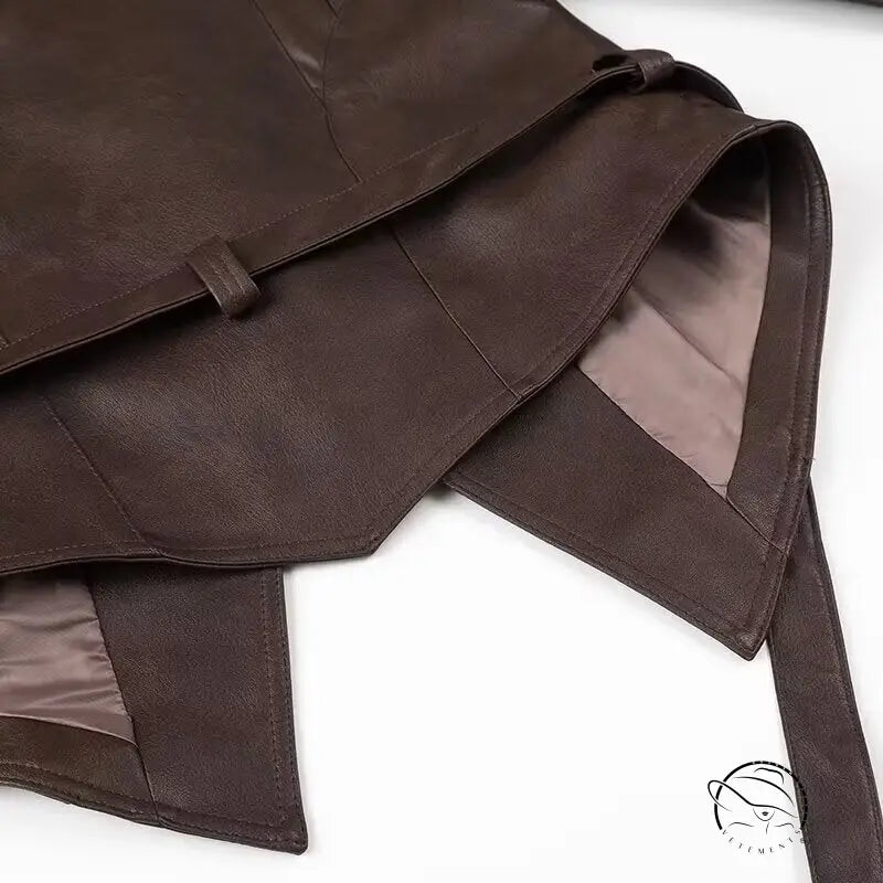 Brown faux leather jacket with adjustable strap and pocket detail