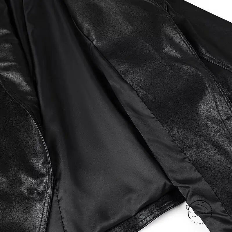 Stylish faux leather jacket with zipper details and quilted lining