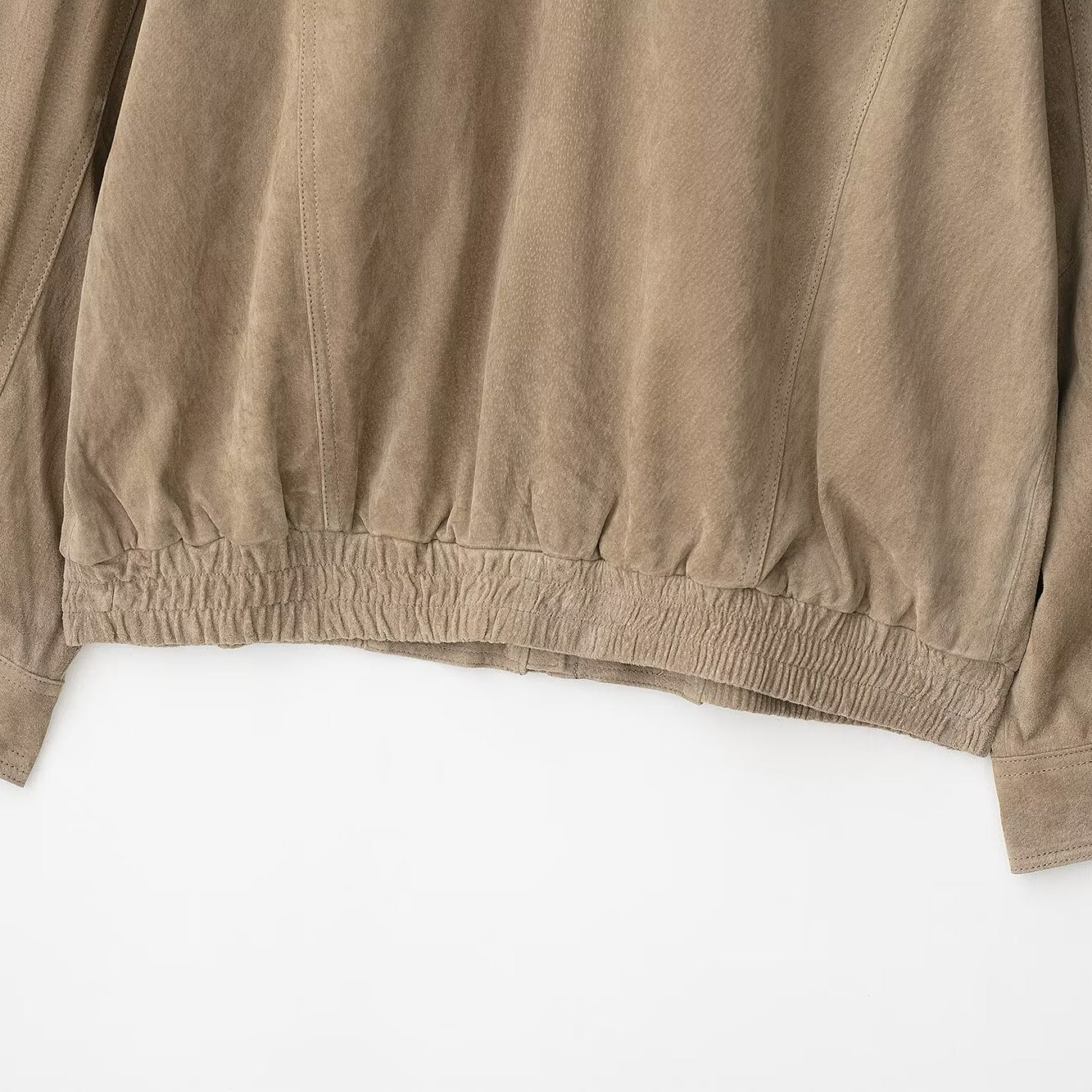 Elegant suede textured leather coat with beige long-sleeved fashion blouse