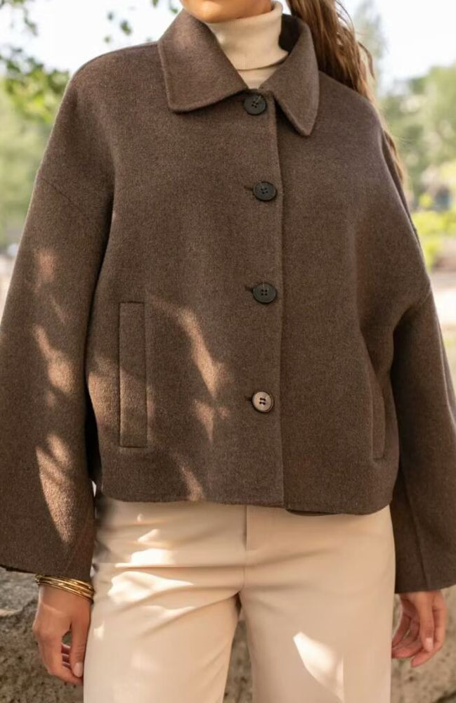 Langry fashion brown wool cape with button closure and patch pockets