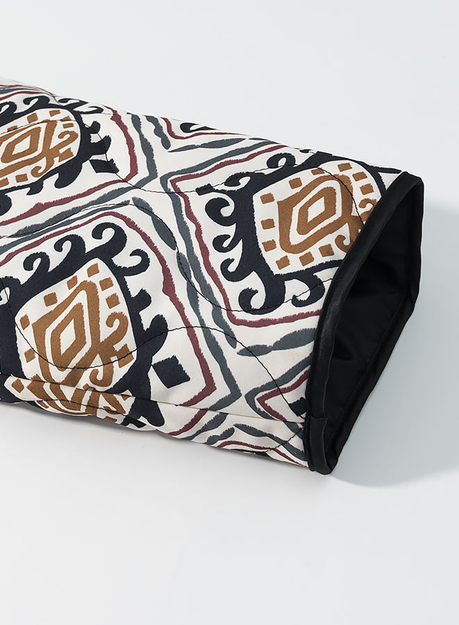 Rolled black and white patterned yoga mat with brown accents, langry fashion apparel