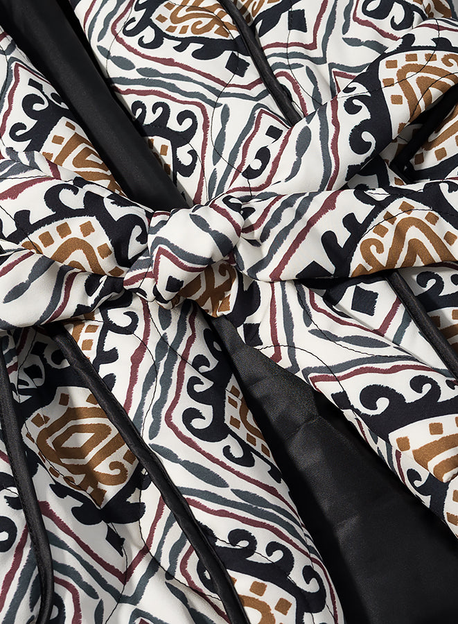 Langry fashion black and white patterned quilted jacket with brown accents