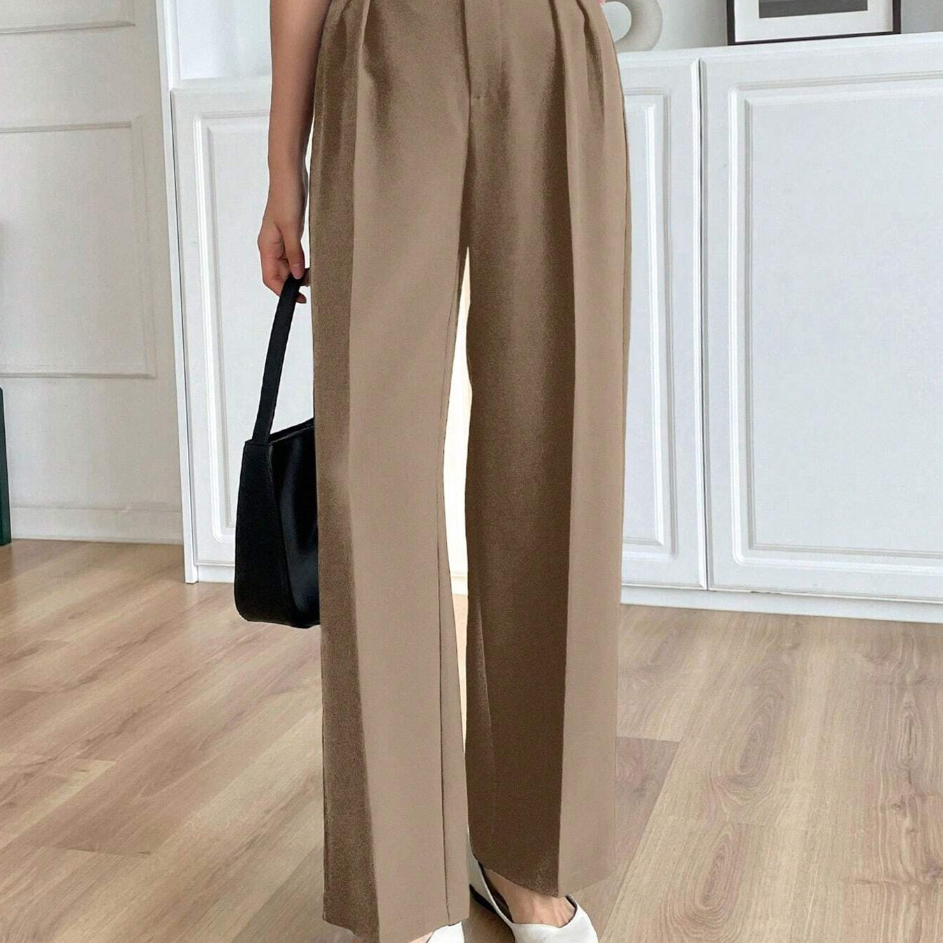 Beige high-waisted wide-leg Langry fashion pants with pleats and white flats