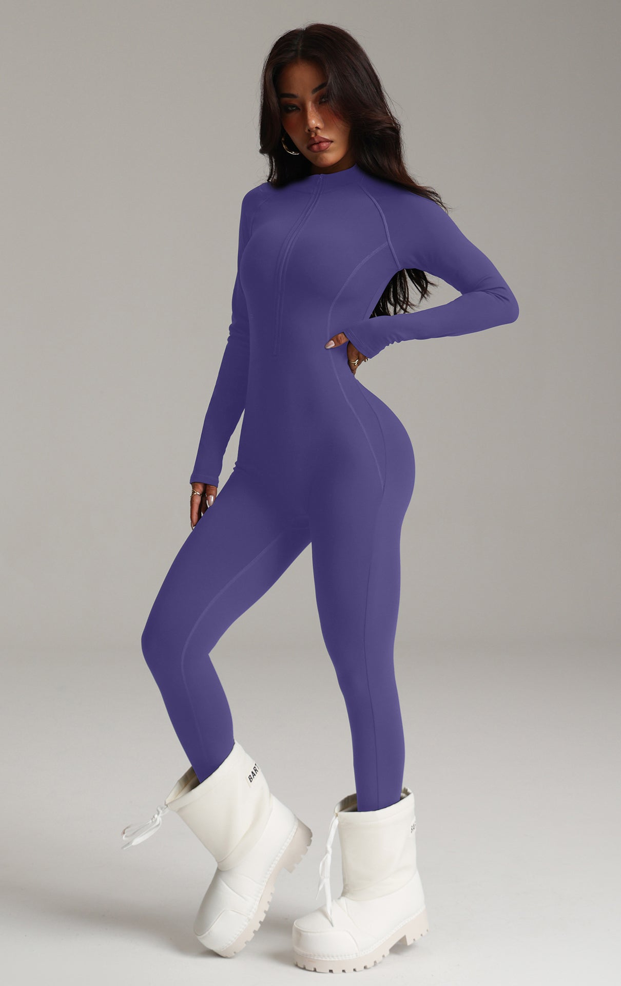 Purple Langry fashion bodysuit with fur-lined boots for yoga