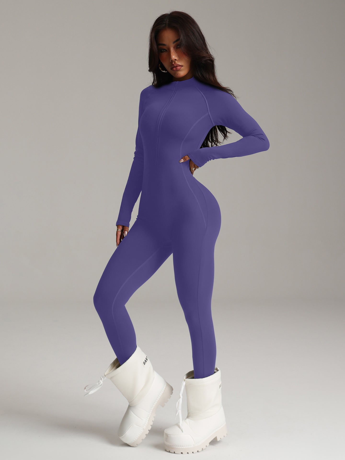 Purple Langry fashion bodysuit with fur-lined boots for yoga