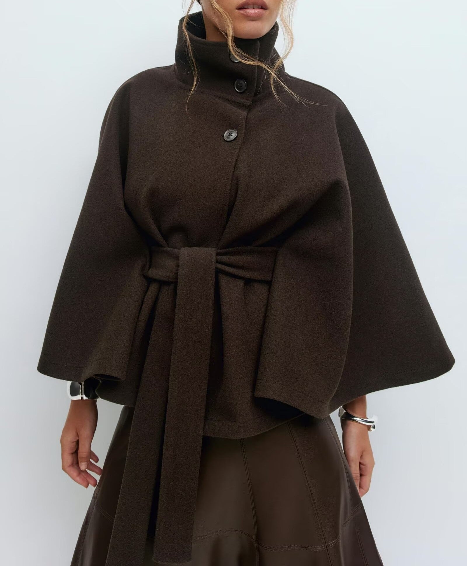 Graceful langry fashion brown wool cape coat with high collar, buttons, and wide belt